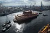 The Akademik Lomonosov being maneuvered by tug boats in the Port of Murmansk. (Photo: Courtesy of Rosatom)