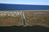 Aerial view of the old runway now used for housing, Shishmaref, Alaska. (Photo: Lawrence Hislop/Grid Arendal).
