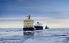 Rosatomflot icebreaker escorting a convoy of vessels through the icy waters of the Northern Sea Route.