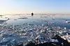 Sailing through Arctic waters.