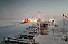 Teekay LNG Carrier on the Northern Sea Route assisted by a Rosatom nuclear icebreaker // Et LNG-skp fra Teekay får assistanse av en atomdrevet isbryter fra Rosatom. (Foto: Teekay)