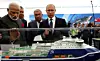 Russian President Vladimir Putin, Indian Prime Minister Narendra Modi, and Rosneft CEO and Chairman Igor Sechin at the Zvezda Shipyard in Bolshoi Kamen, Russia.