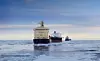 Rosatomflot icebreaker escorting a convoy of vessels through the icy waters of the Northern Sea Route.