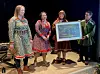 Sametingspresident Silje Karine Muotka (andre t.v.) og Sandra Márjá West, politisk rådgiver for sametingsrådet (ytterst t.v.), var til stede på åpningen av Samisk hus i Tromsø/Romssa Sámi Viessu. Her overrekker de en gave fra Sametinget til huset ved daglig leder Jill Abelsen Olsen og styreleder Torjer Olsen. Dette er et fotografi fra den gamle samiske sommerboplassen i Romsavággi/Tromsdalen fra rundt år 1920. Bildet er tilrettelagt av den samiske kunstneren Hans Ragnar Mathisen. (Foto: Sametinget)