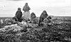 Inuit from Schultz Lake rest while en route to hunt caribou at the Thelon Game Sanctuary, in what is now Nunavut, in 1930. (W.H.B.Hoare/Canada. Dept. of Indian and Northern Affairs/Library and Archives Canada/PA-102646)