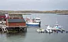 Fiskebåtene ligger til kai på Helligvær