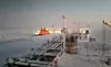 Teekay LNG Carrier on the Northern Sea Route assisted by a Rosatom nuclear icebreaker // Et LNG-skp fra Teekay får assistanse av en atomdrevet isbryter fra Rosatom. (Foto: Teekay)